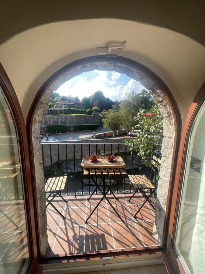 Apartamento Colgante Al Rio Con Vistas Al Puente カンプロドン エクステリア 写真
